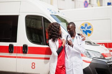 Two african paramedic ambulance emergency crew doctors.