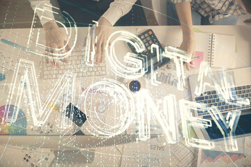 Double exposure of man and woman working together and crypto theme hologram drawing. Computer...