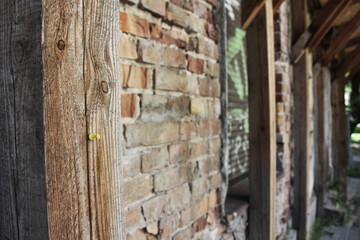 Fototapeta na wymiar old dilapidated brick building with graffiti