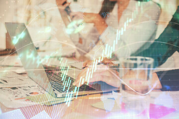 Multi exposure of woman hands typing on computer and forex chart hologram drawing. Stock market analysis concept.