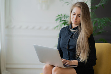 young businesswoman working on laptop