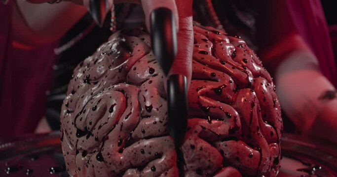 Dark red lighting, succubus is touching a human brain with her finger, 4k