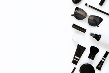 Woman's beauty, cosmetic products and accessories set on white background. Creative flat lay top view composition with copy-space.