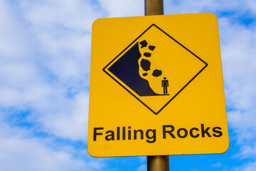 Falling rocks warning sign of danger, Australia.