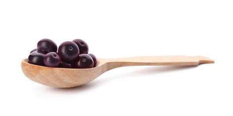 Fresh acai berries in wooden spoon isolated on white