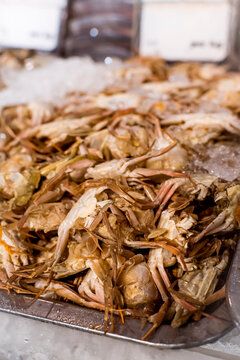 A pile of Baby Crabs for sale at a supermarket or seafood market.