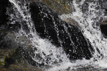 water flowing into the waterfall