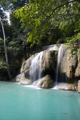 Fototapeta na wymiar Erawan Waterfall is located in the Erawan National Park area, Kanchanaburi, Thailand