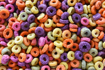 An abstract image of multi color children's breakfast cereal.  - Powered by Adobe