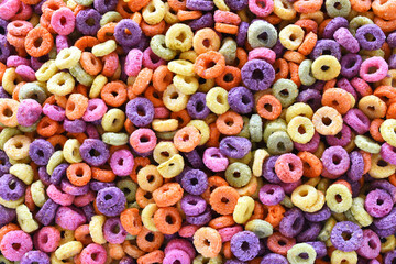 An abstract image of multi color children's breakfast cereal. 