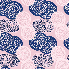 Bright pastel dot circles seamless pattern. Light pink background with white and navy blue figures.
