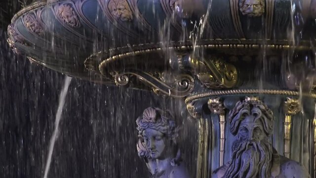 Paris, France: Famous fountain in the Place du Concorde in the night, real time, denoise
