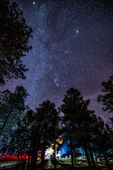 Fototapeta premium Milky Way on Mather Campground at Grand Canyon National Park. Long exposure on camp car lighting up.