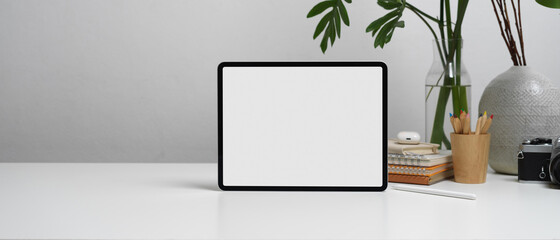 Close up view of digital tablet with clipping path on white table