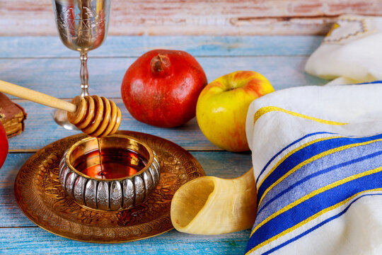 A jewish new year with honey for the apple and pomegranate holiday of Rosh Ha Shana