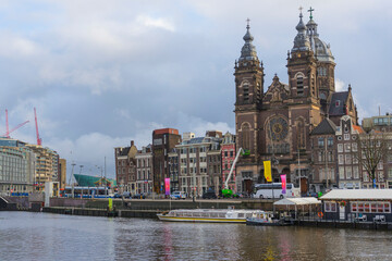 Obraz premium View of Basilica of Saint Nicholas located in the Old Centre of Amsterdam, near the Central railway Station,Amsterdam, Netherlands