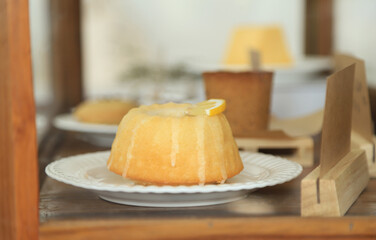 Americano iced coffee with lemon cake in home 