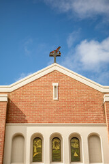 Galahs on church cross.