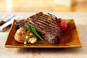 beef steak with potato and tomato