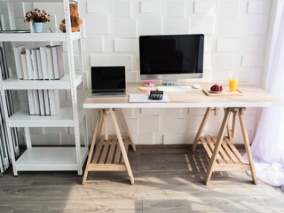 Living room house have computer notebook tablet pc freetime strawberry orange juice on table wood and bookshelf  for wor from home technology digital online network new normal social distancing 
