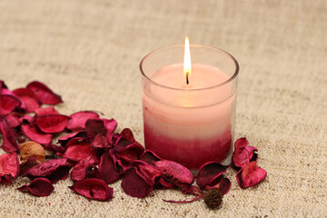 candle and rose petals