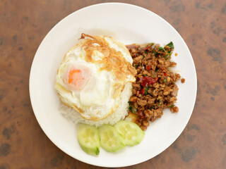 Pad Kra Pao or stir fried chicken with holy basil as traditional Thai food
