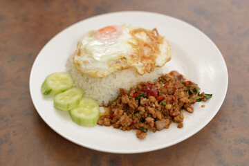 Pad Kra Pao or stir fried chicken with holy basil as traditional Thai food