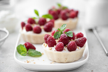 dessert with mascopone cheese, fresh raspberries and nuts