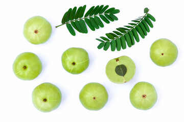 gooseberry fruits ( Amla ) with green leaf isolated on white background. Top view. Flatlay.