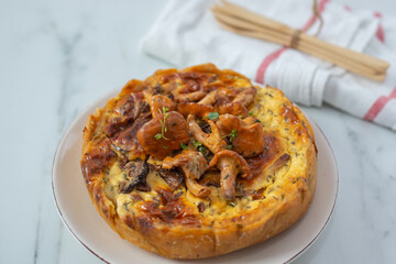 Home made quiche with chanterelles 