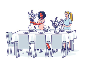 Women serving table preparing elegant flowers for dinner or luxury banquet