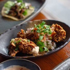 Mexican style fried chicken and herbs