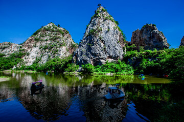 Close-up natural background of atmosphere surrounded by large rocky mountains, natural reservoirs and various trees, the integrity of the ecology