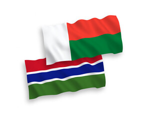 Flags of Republic of Gambia and Madagascar on a white background