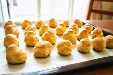 A tray of golden cream puff with no whipping cream