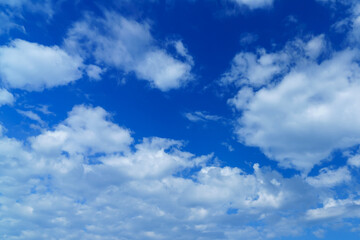 Fototapeta premium Blue sky background with clouds.