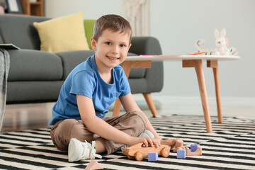 Cute little boy playing at home © Pixel-Shot