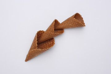 Ice cream waffle cones on white background. Top view