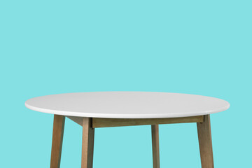Dining table on color background