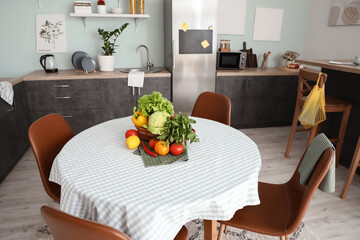 Interior of stylish modern kitchen with dining table