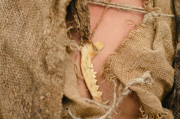 fragment of medieval clothing made of sacking