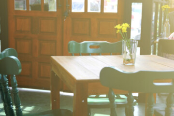blur picture of table and chairs in restaurant