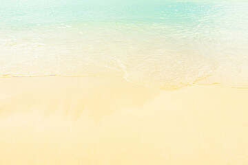Fototapeta na wymiar sea water and sand on tropical beach at Phuket province, Thailand