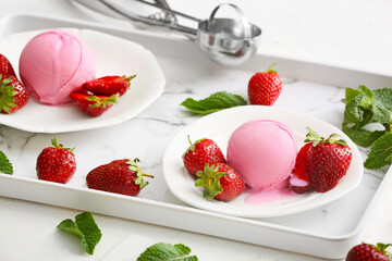 Tasty strawberry ice cream on tray