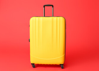 Packed suitcase on color background. Travel concept