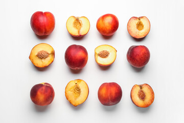 Sweet ripe peaches on white background