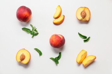 Sweet ripe peaches on white background