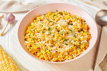 Parmesan Cilantro Corn in a pink bowl