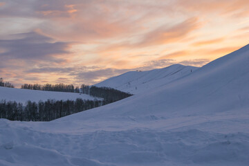 Beautiful sunset in the mountains. Spring in the Altai Mountains. Altai Krai, Russia.