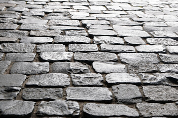 An ancient pavement lined with stone paving stones.
